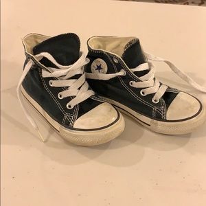 Black high top converse sneakers